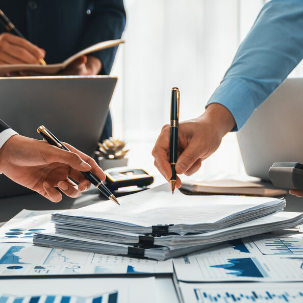 Auditor team working in office, analyzing financial data and accounting. Insight